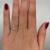 Picture of Emerald Cut Solitaire with Diamond Shoulders (0.77ct) 